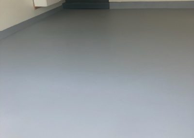 The garage floor was prepared and sprayed with Gatorhyde coating